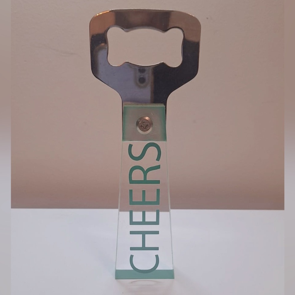 Silver and Clear Bottle Opener